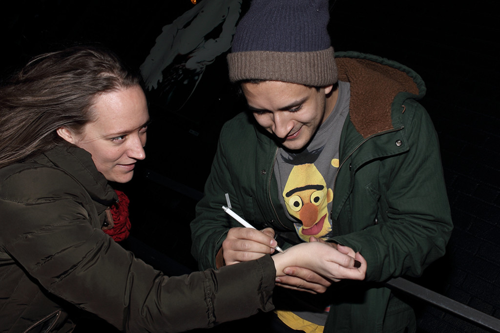 One of the guys from Folding Legs signing and aoutograph