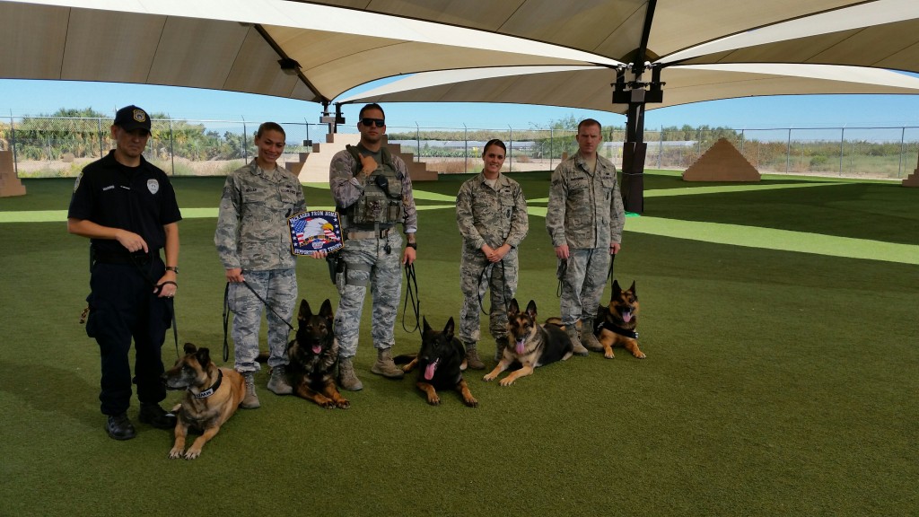 PHOENIX: Pictured here are: Officer Richard Harris with MWd Dyngo, Jessie Keller with MWD Crach, SSgt Justin Gonzalez with MWD Rango, SSgt Mariah Langeland with MWD Wax, and SrA Sean Mcfadden with MWD Maxo